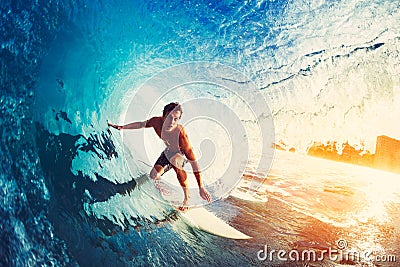 Surfer on Blue Ocean Wave Stock Photo