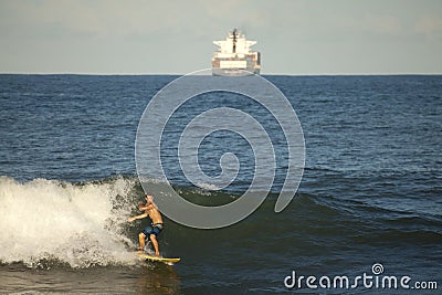 Surfer catching a wave, Durban Editorial Stock Photo