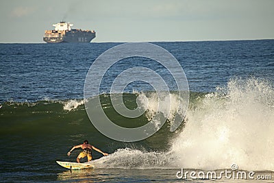 A surfer catching a wave, Durban Editorial Stock Photo