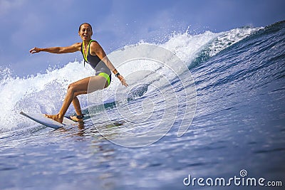 Surfer girl on Amazing Blue Wave Stock Photo