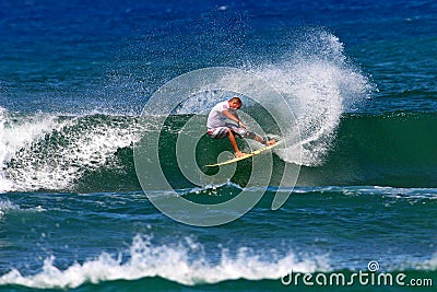 Surfer Mikey Bruneau Surfing in Honolulu, Hawaii Editorial Stock Photo