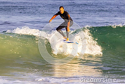 Surfer in the Pacific Ocean in California Editorial Stock Photo