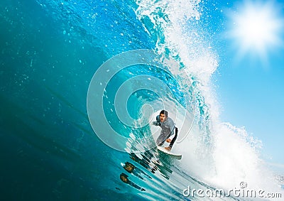 Surfer on perfect Wave Stock Photo