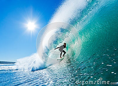 Surfer on Perfect Wave Getting Barreled Stock Photo