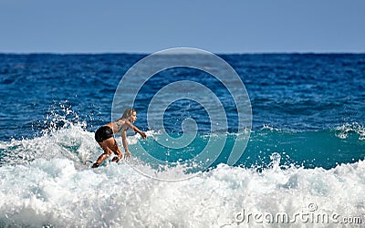 Surfer school. Beautiful young woman in swimsuit. Surfer on the wave. beautiful ocean wave. Water sport activity Editorial Stock Photo