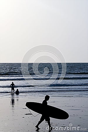 Surfer silhouette kuta beach bali Stock Photo