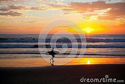 Surfer sunset Stock Photo