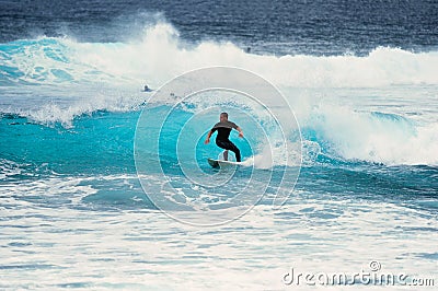 Surfer on wave Stock Photo