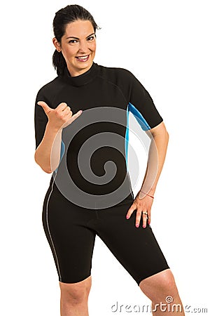 Surfer woman giving hang loose sign Stock Photo