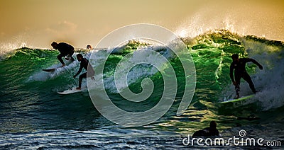 Surfers in breaker Editorial Stock Photo