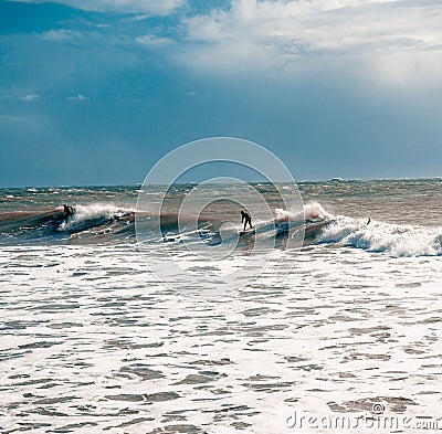 Surfers Stock Photo