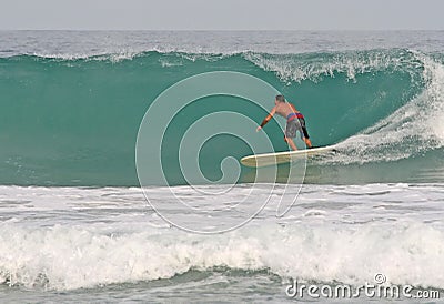 Surfing Hollow Waves Stock Photo