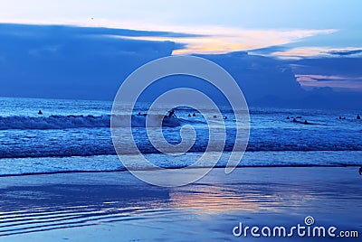 Surfing kuta beach Indonesia Stock Photo