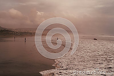 Surfing perfect waves at Madraba, Taghazout, Morocco Stock Photo