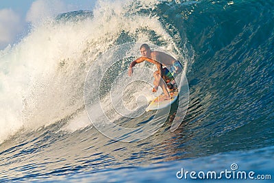 Surfing a Wave. Stock Photo