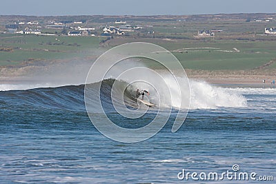 Surfing the Waves Stock Photo