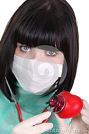 Surgeon auscultating a heart Stock Photo