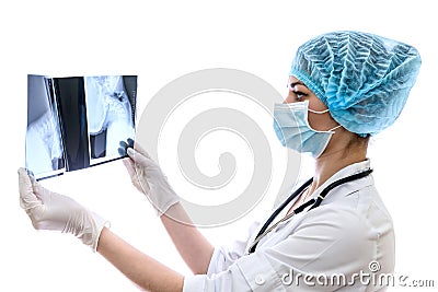 Surgeon examining patient`s x-ray on white background Stock Photo
