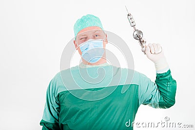 Surgeon holding antique, old fashioned medical drill Stock Photo