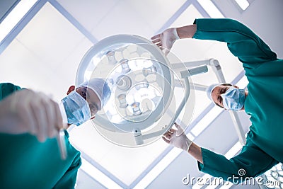 Surgeons operating in operation theater Stock Photo