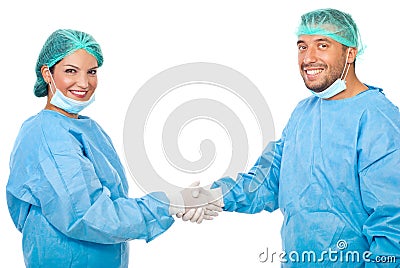 Surgeons team handshake Stock Photo