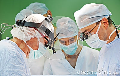 Surgeons team at operation Stock Photo