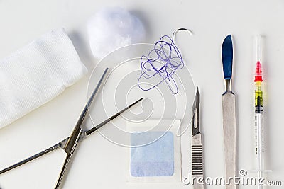 Surgery operation equipment, scalpel, knife, needle and suture. Studio shoot Stock Photo