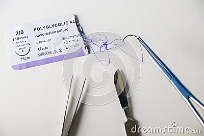 Surgery operation equipment, scalpel, knife, needle and suture. Studio shoot Editorial Stock Photo