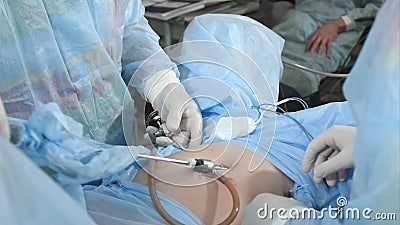 Surgery team in the operating room doing laproscopic operation Stock Photo