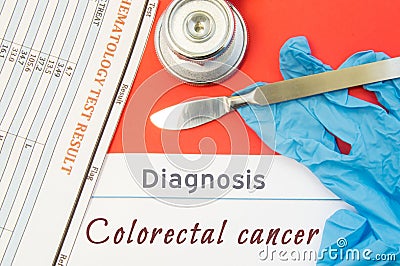 Surgical diagnosis of Colorectal cancer. Surgical medical instrument scalpel, latex gloves, blood test analysis lie close beside t Stock Photo