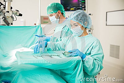 Surgical instrumentist working in a hospital Stock Photo