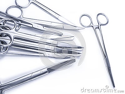 Surgical instruments not arranged in a pattern isolated Stock Photo