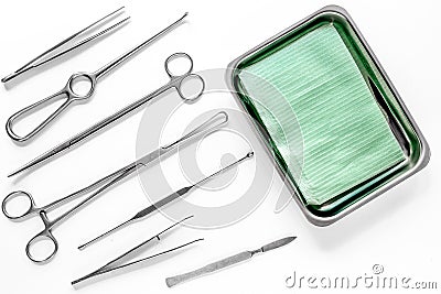 Surgical instruments and tools including scalpels, forceps and tweezers on white table top view mock up Stock Photo