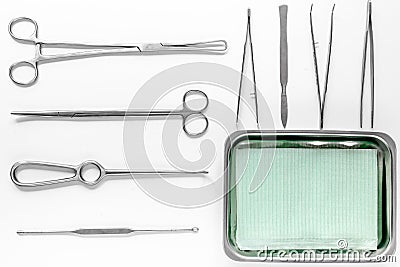 Surgical instruments and tools including scalpels, forceps and tweezers on white table top view mock up Stock Photo