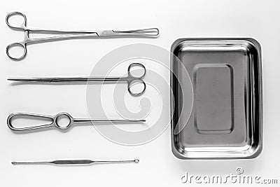 Surgical instruments and tools including scalpels, forceps and tweezers on white table top view mock up Stock Photo