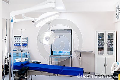 Surgical lamps in empty operating room. Emergency room interior, modern hospital details Stock Photo