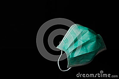 Surgical mask Doctor isolated on black background - for prevent dust PM 2.5, disease Coronavirus or COVID-19 Stock Photo