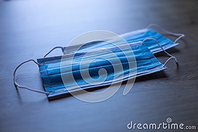 Surgical medical face mask on table Stock Photo