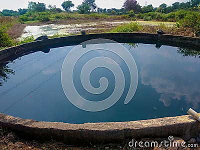 Surplus water - well groundwater resource pune, maharashtra india Stock Photo
