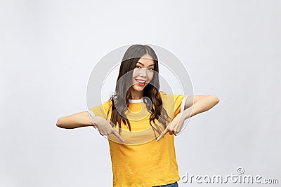 Surprise Asian Woman with finger point up isolate on white. Stock Photo