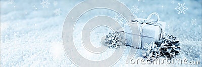 Surprise gift in blue frosty snow Stock Photo