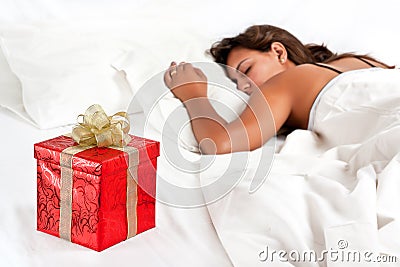 Surprise Present waits woman Christmas - Valentine Stock Photo