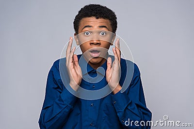 Surprised African American teenager is agitated Stock Photo