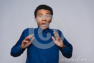 Surprised African American teenager is agitated Stock Photo