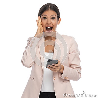 Surprised attractive girl opening mouth and screaming Stock Photo