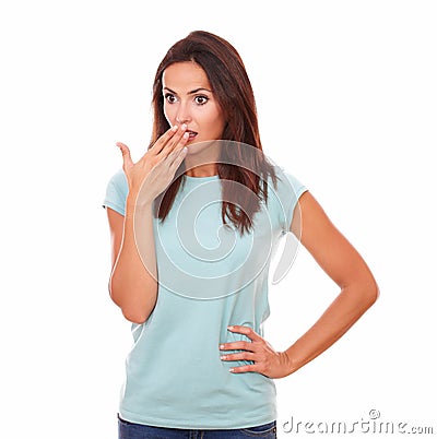 Surprised attractive woman looking at people Stock Photo