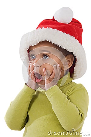 Surprised baby girl with red hat of Christmas Stock Photo