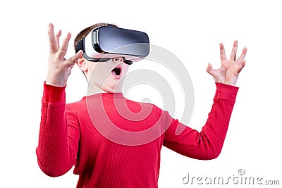 Surprised boy wearing virtual reality glasses Stock Photo