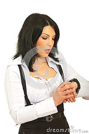 Surprised business woman checking time Stock Photo