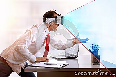 Surprised businessman with virtual reality glasses and blue vision representation Stock Photo